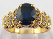 Appraisal: A French hallmarked carat gold sapphire and diamond ring grams