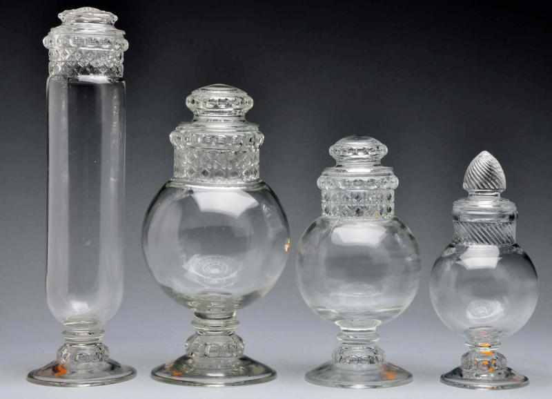 Appraisal: Lot of Glass Apothecary Candy Jars with Lids Description Circa