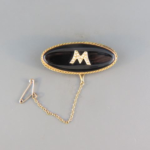 Appraisal: k Gold and Black Onyx Pin circa seed pearls in