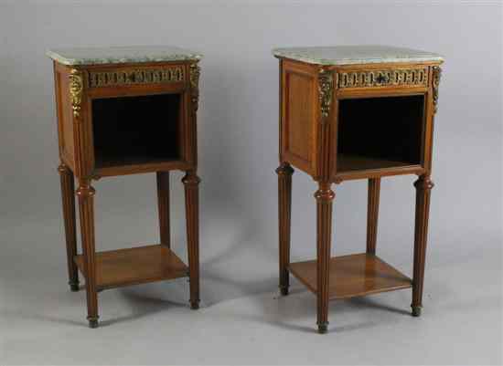 Appraisal: A pair of French satinwood marble top side tables with