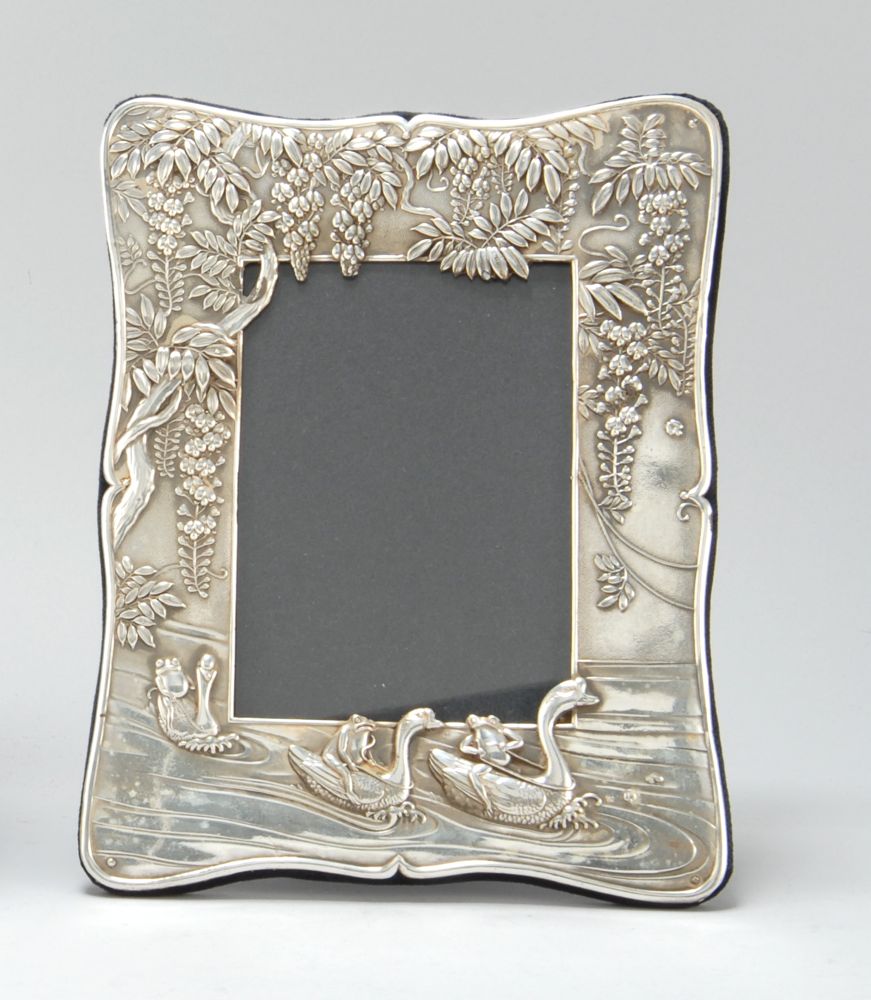 Appraisal: STERLING SILVER PICTURE FRAME With chased decoration of frogs riding