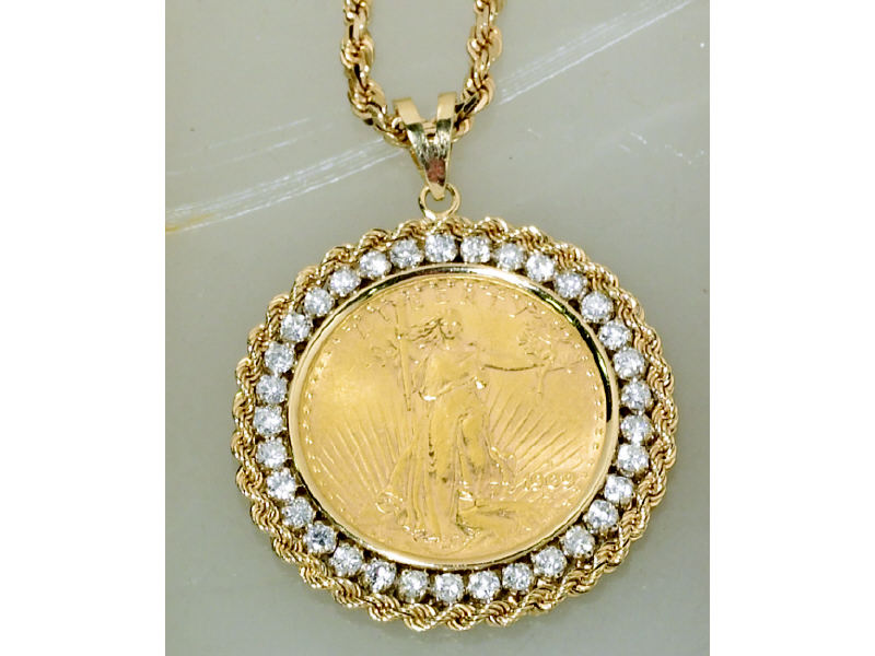 Appraisal: COIN PENDANT WITH DIAMOND BEZEL Twenty dollar Saint Gaudens dated