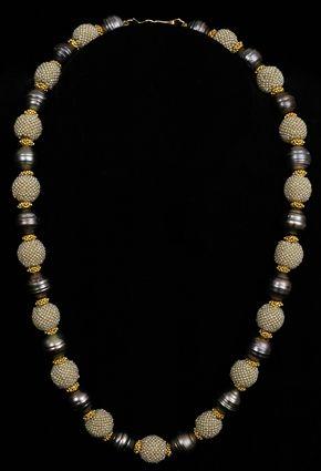 Appraisal: BLACK BAROQUE PEARL NECKLACE WITH SEED PEARLS AND GOLD SPACERS