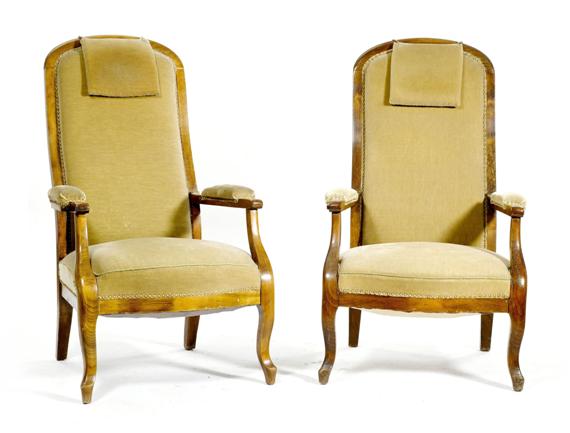 Appraisal: PAIR OF VOLTAIRE-ARMCHAIRS Louis-Philippe style Walnut Brown cloth covers In