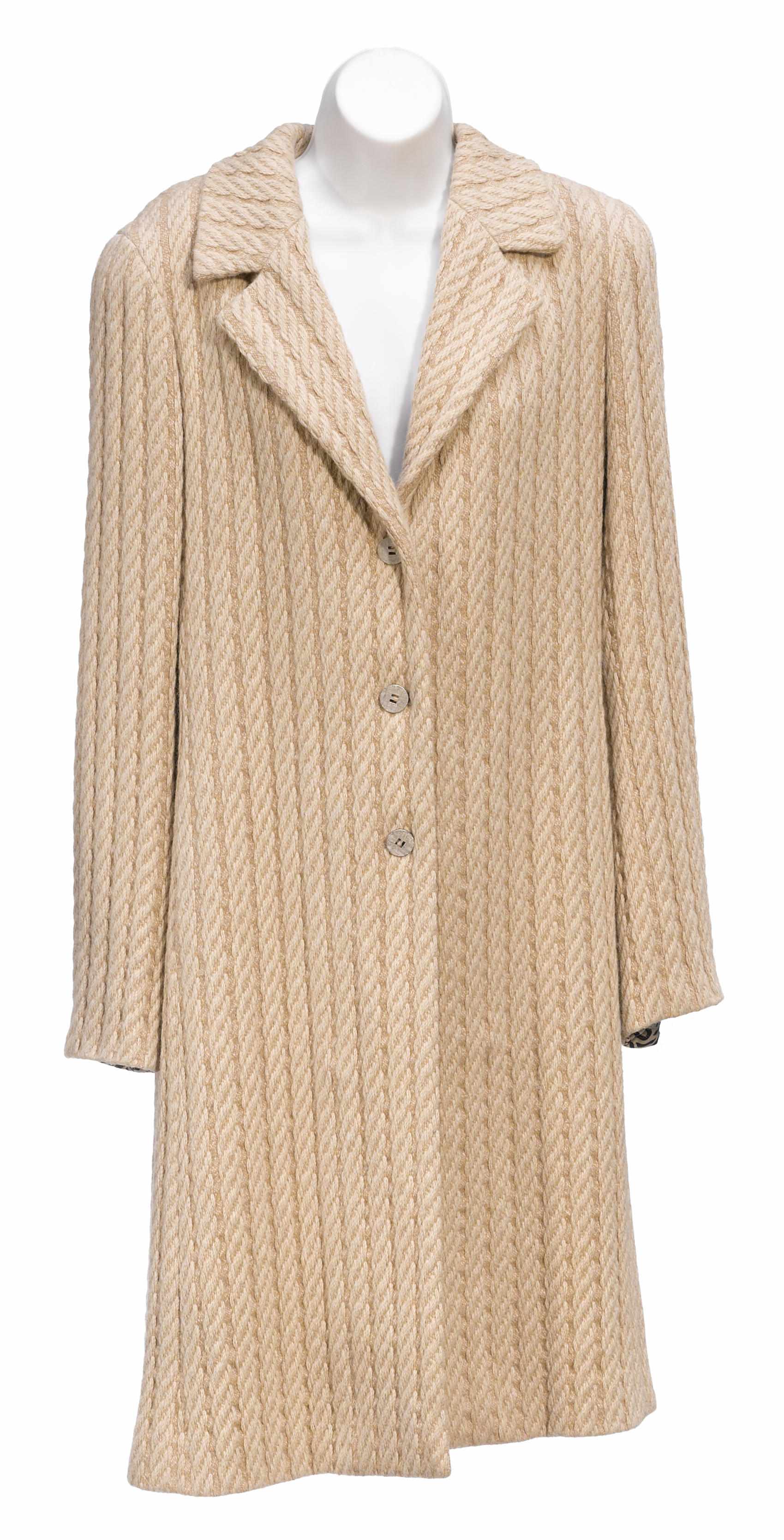 Appraisal: A Chanel tan coat size together with a cream cashmere