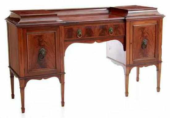 Appraisal: Edwardian inlaid mahogany sideboard early th century shaped and molded