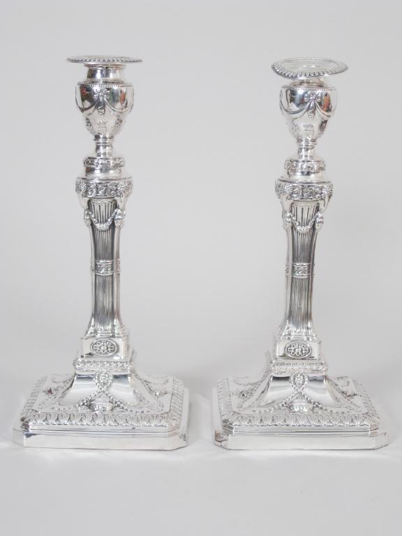 Appraisal: Pair of George V Adam style Pillar Candlesticks with fluted