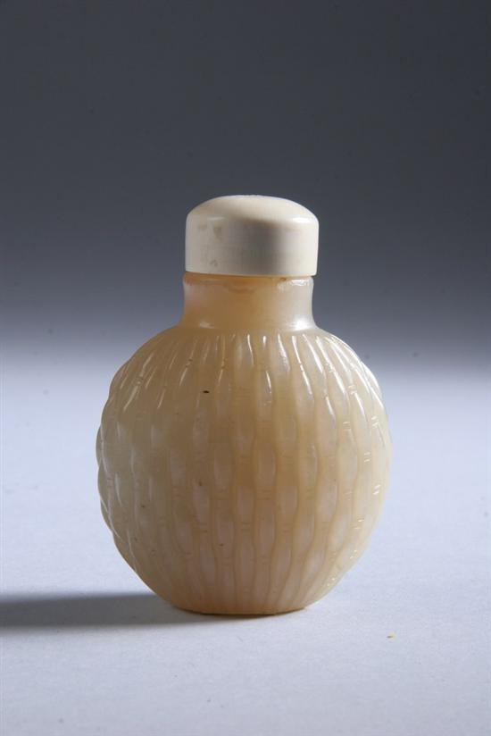 Appraisal: CHINESE WHITE JADE SNUFF BOTTLE Of flattened ovoid-form carved to