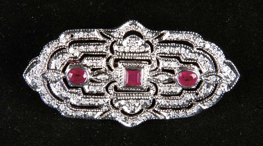 Appraisal: DIAMOND RUBY BROOCH Lovely Edwardian style brooch is done in