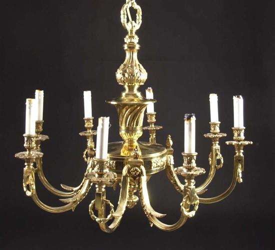 Appraisal: FRENCH STYLE BRASS EIGHT-LIGHT CHANDELIER th century Baluster-turned standard issuing