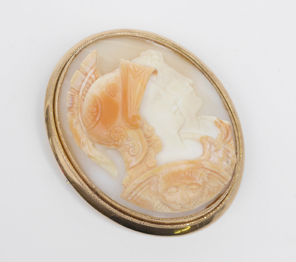 Appraisal: K NEOCLASSICAL-STYLE CAMEO ARES ATHENA Carved soft shell cameo portrait