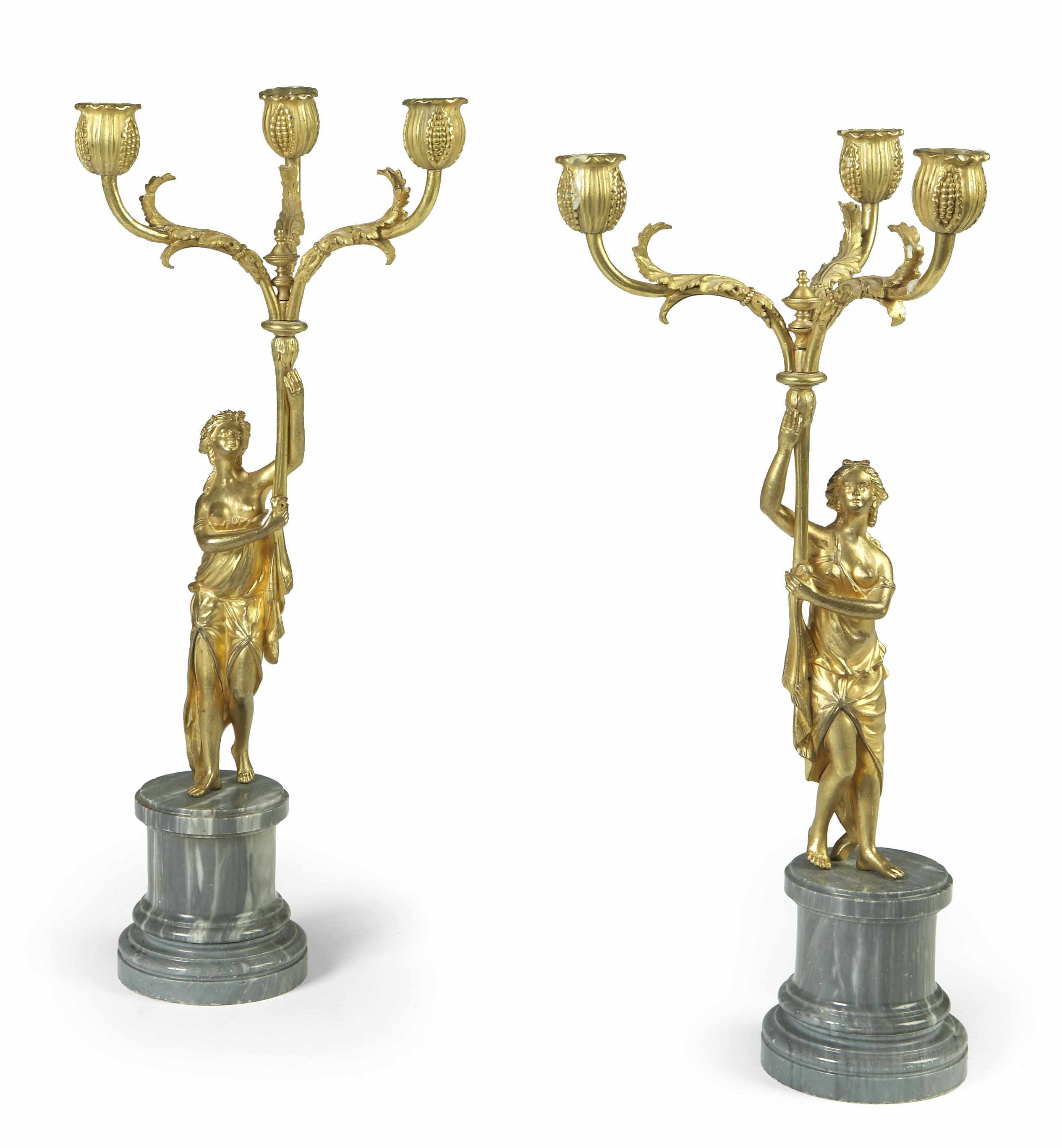 Appraisal: A pair of French gilt bronze and marble figural three