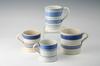 Appraisal: MUGS - Lot of four th c blue banded porcelain