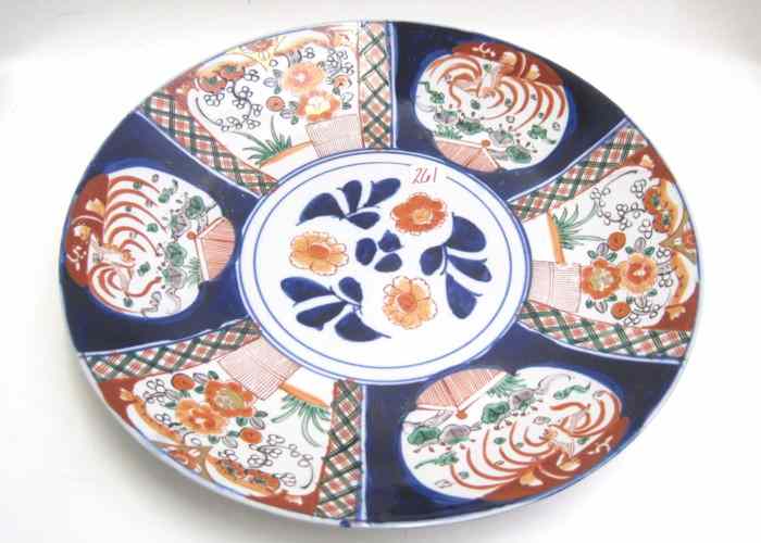 Appraisal: JAPANESE IMARI PORCELAIN CHARGER hand painted in traditional bird and