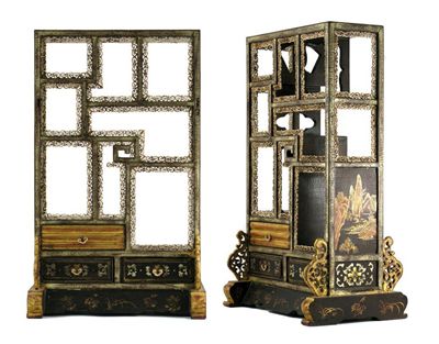 Appraisal: A black lacquer miniature display stand with eight compartments above