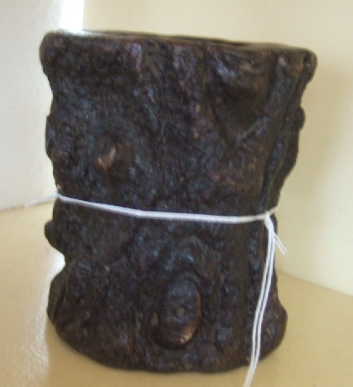 Appraisal: A Chinese brush pot modelled as a gnarled wood tree