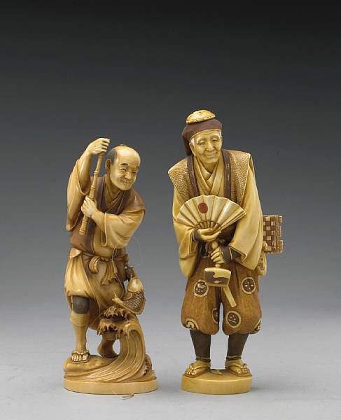 Appraisal: Two tinted ivory figural okimono th Century The first of