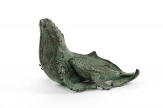 Appraisal: A CAST BRONZE MODEL OF A WHALE AND HER CALF