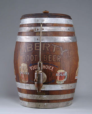 Appraisal: LIBERTY ROOT BEER OAK BARREL DISPENSER Colorful decal graphics adorn