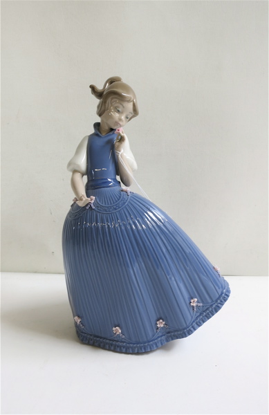 Appraisal: LLADRO GIRL BLUE DRESS of soft paste porcelain Jose Puche