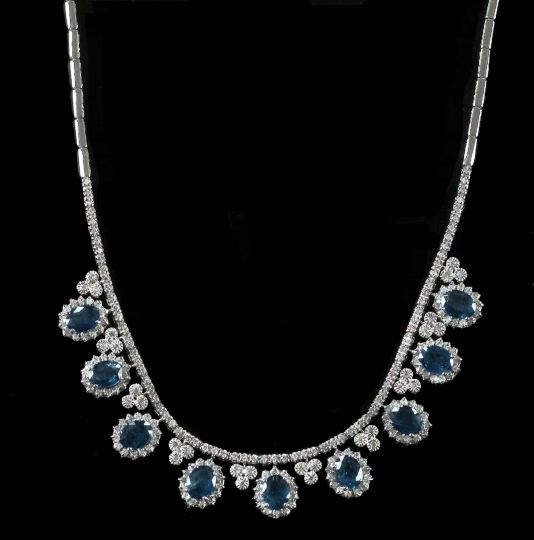 Appraisal: Fourteen-Karat White Gold Sapphire and Diamond Necklace featuring nine oval