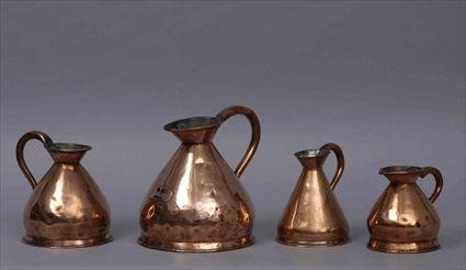 Appraisal: ASSEMBLED GROUP OF FOUR VICTORIAN COPPER MEASURES Of swelling or