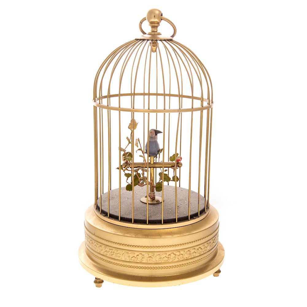 Appraisal: Contemporary song bird automaton brass cage with wind-up singing and