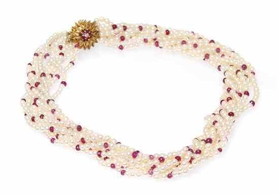 Appraisal: A Multistrand Cultured Pearl and Ruby Bead Necklace consisting of