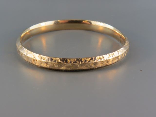 Appraisal: Gold-Filled Bangle Bracelet engraved floral wide across vintage