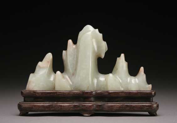 Appraisal: CELADON JADE BRUSHREST Chinese Ming-style celadon jade brushrest carved in