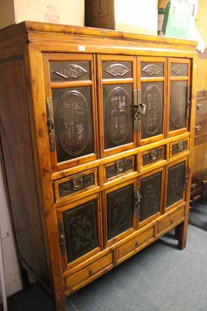 Appraisal: A LARGE CONTEMPORARY CHINESE CABINET with elm and lacquer fitted