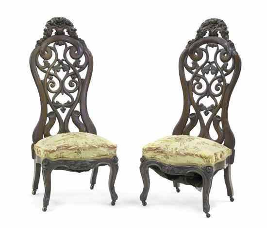 Appraisal: A Pair of Victorian Slipper Chairs in the manner of