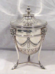 Appraisal: A fine Edwardian Adam style silver sugar vase and cover