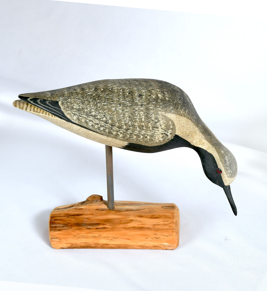 Appraisal: HARRY SHOURDS SHOREBIRD CARVING Inset glass eyes mounted on a