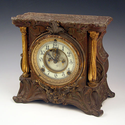 Appraisal: ANSONIA CAST IRON MANTLE CLOCK Heavy cast iron with gilt