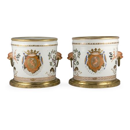 Appraisal: Pair of Chinese Export Gilt-Metal Mounted Armorial Cachepots Estimate -