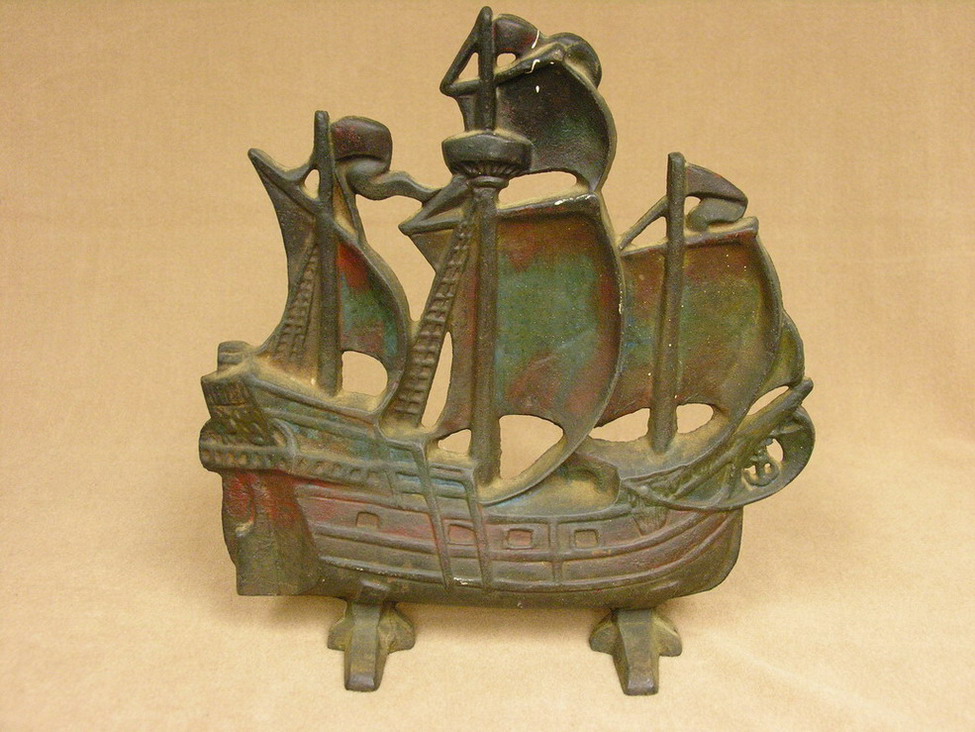 Appraisal: VINTAGE CAST IRON SHIP DOOR STOP The ship still retains