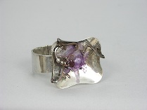 Appraisal: A Mexican Sterling Bracelet with a Carved Amethyst Fish A