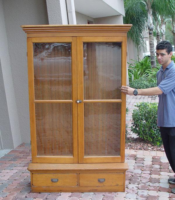 Appraisal: LATE VICTORIAN DOUBLE DOOR BOOKCASE glass doors over half length