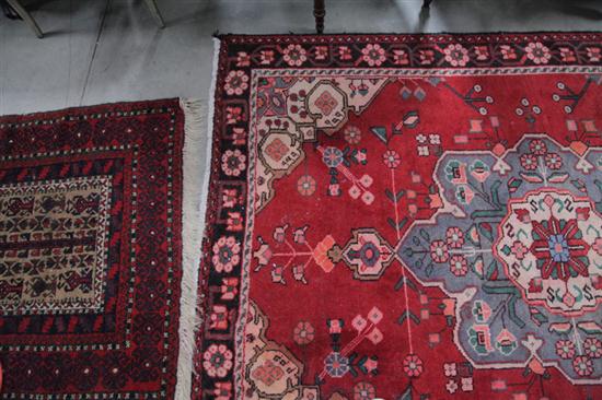 Appraisal: TWO ORIENTAL STYLE RUGS Both area rugs Red field with