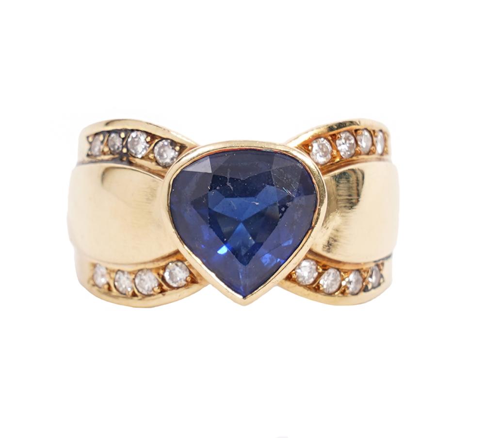 Appraisal: K YG DIAMOND SAPPHIRE BAND STYLE RING K yellow gold