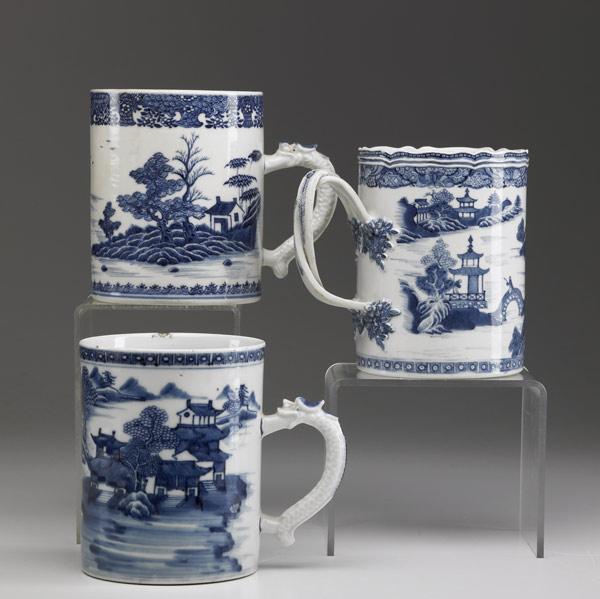 Appraisal: CHINESE EXPORT Three blue and white cider mugs with landscape