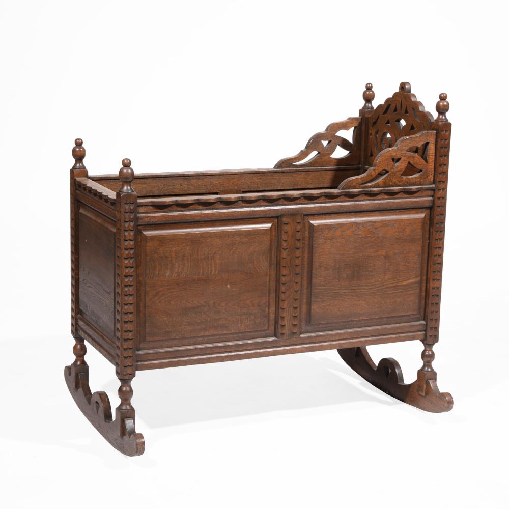 Appraisal: AMERICAN RENAISSANCE-STYLE CARVED OAK CRADLEAntique American Renaissance-Style Carved Oak Cradle