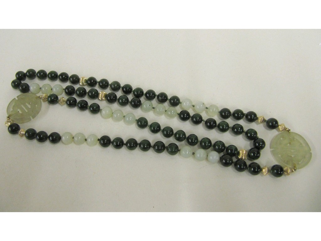 Appraisal: Long string of Chinese jade beads Approx in