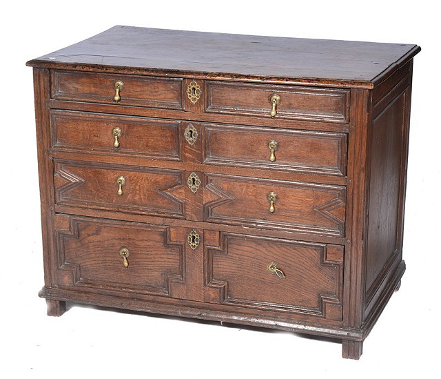 Appraisal: A TH CENTURY OAK MOULDED FRONT CHEST of four long