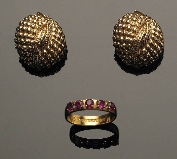 Appraisal: A pair of k gold dome ear-clips with a ruby