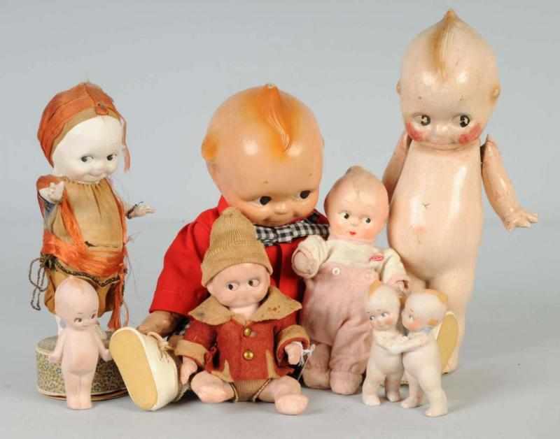 Appraisal: Lot of Kewpie Dolls Description Papier-mache Kewpie on Candy Box