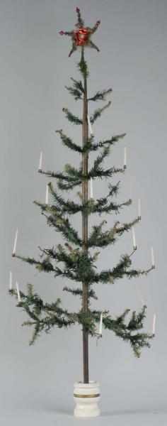 Appraisal: Christmas Feather Tree Description Includes berries tree topper candle holders