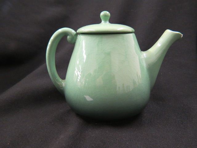 Appraisal: Roseville Pottery Teapot blue green shiney glaze late 's unnamed