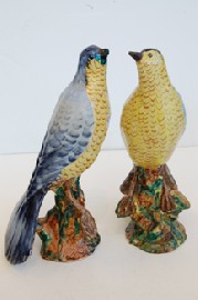 Appraisal: PAIR OF ITALIAN HAND PAINTED POTTERY BIRD FIGURES ONE CHIPPED